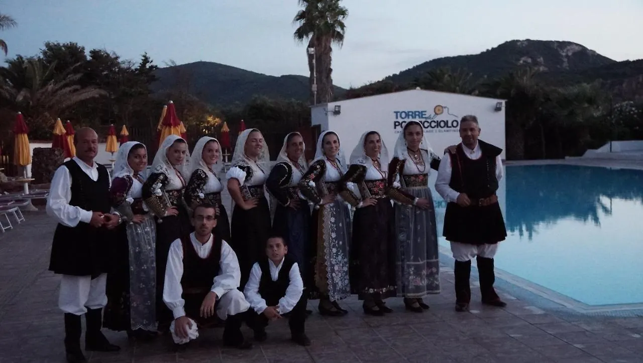 **** مكان تخييم Villaggio Camping Torre Del Porticciolo بورتو كونتي إيطاليا